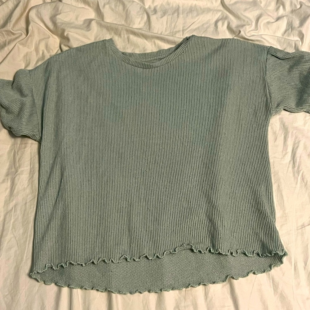 Green short blouse.